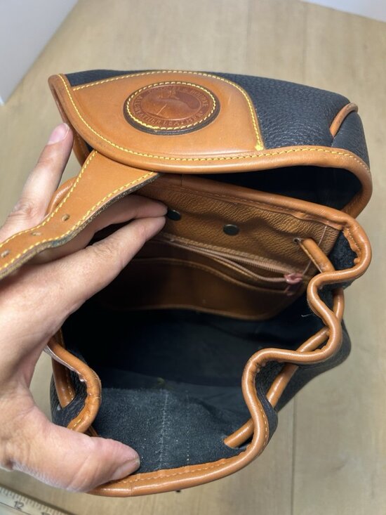 Vintage Dooney & Bourke Black Tan Color All Weather Leather Backpack